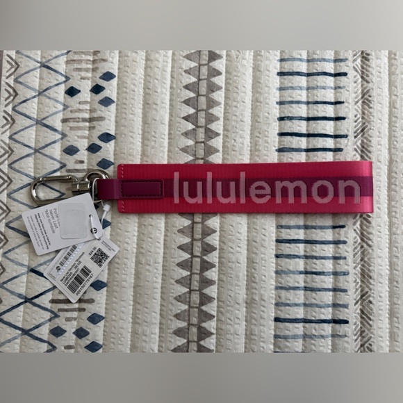 Lululemon Never Lost Keychain in Sakura Pink - Picture 1 of 2